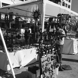 Group of people at market stall