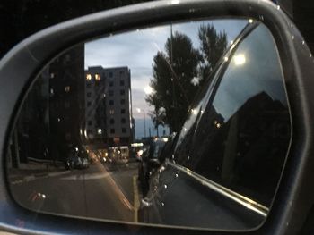 Reflection of car on car window