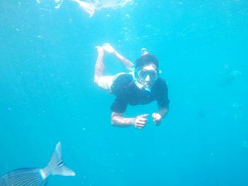 Man swimming in sea