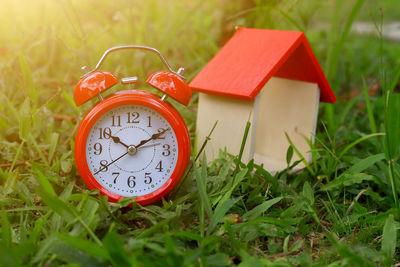 Close-up of clock on field