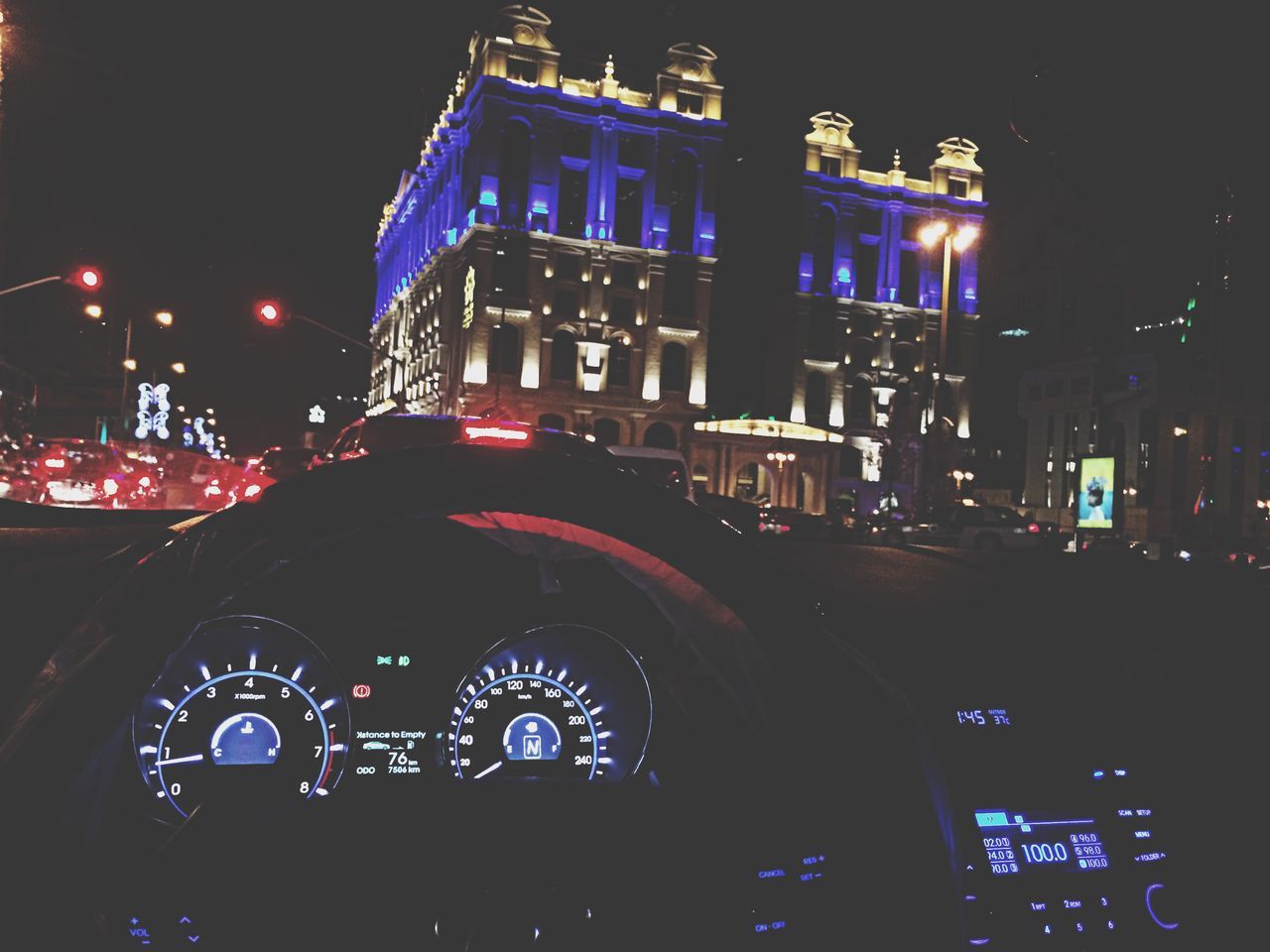 illuminated, night, building exterior, architecture, built structure, low angle view, city, church, lighting equipment, sky, religion, multi colored, street light, outdoors, place of worship, no people, street, building, clock tower