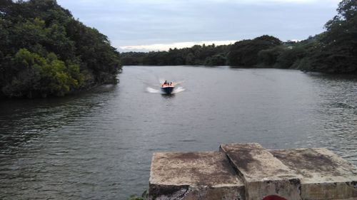 Boats sailing in river