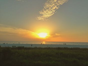 Scenic view of sea at sunset
