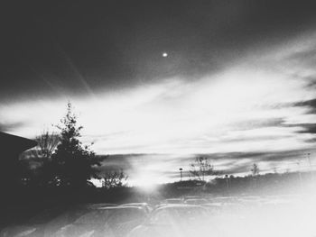 Scenic view of silhouette trees against sky