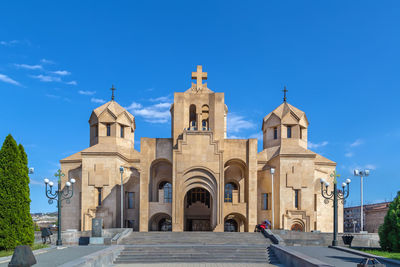 Low angle view of church against blue sky