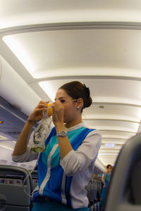 Woman sitting in airplane