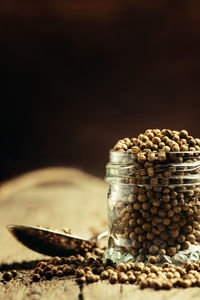 Close-up of ice cream in jar on table