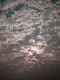 Low angle view of clouds in sky during sunset