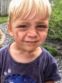 Close-up portrait of smiling boy