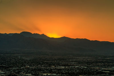 Scenic view of mountains at sunset