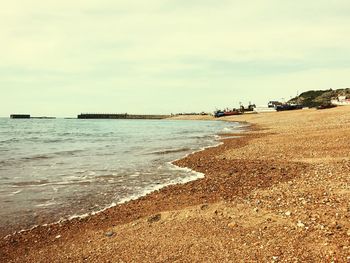 Scenic view of beach against sky