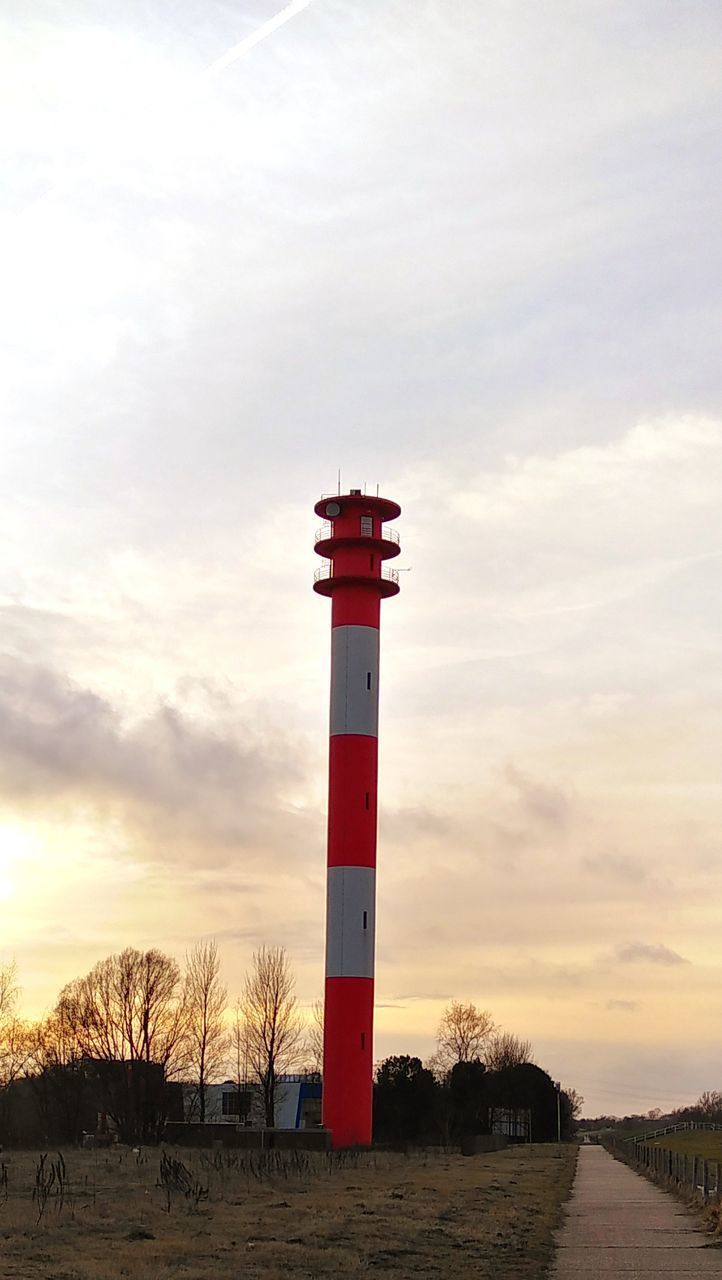 LIGHTHOUSE AGAINST SKY