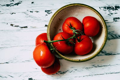 High angle view of cherry tomatoes on table