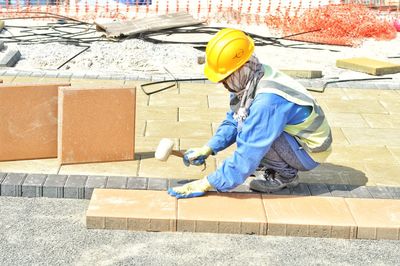 Man working with umbrella