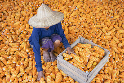 Man working on barbecue grill