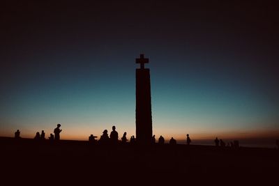 Silhouette people at sunset