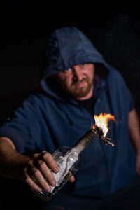 Midsection of man working at night