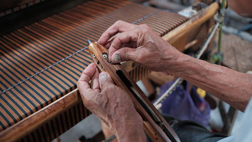 Midsection of man working