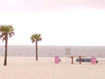 Scenic view of beach against clear sky