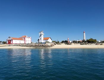 View of buildings on ilha do farol from the sea