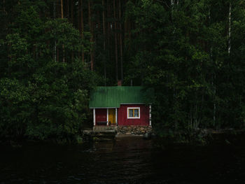 Built structure against trees at night