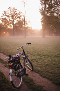 Bicycle parked on field