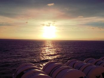 Scenic view of sea at sunset