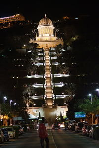 Low angle view of building lit up at night