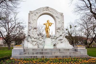 Low angle view of statue against sky