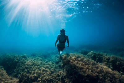 Man swimming in sea