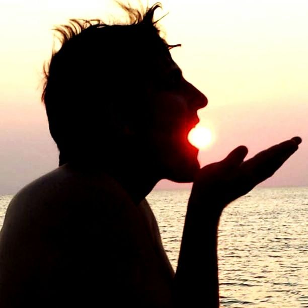 silhouette, sunset, sea, one person, beach, water, headshot, horizon over water, outdoors, sky, people, one man only, nature, adults only, scenics, adult, close-up, beauty in nature, day, only men, young adult