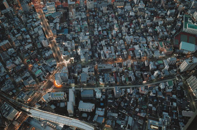 High angle view of illuminated buildings in town