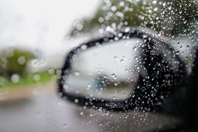 Close-up of wet window in rainy season