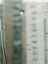 Close-up of water drops on glass