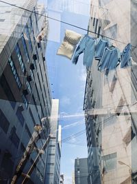 Low angle view of modern buildings against sky