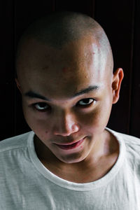 Close-up portrait of a smiling young man