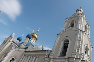 Low angle view of statue against sky