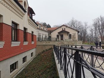 Houses and buildings against sky