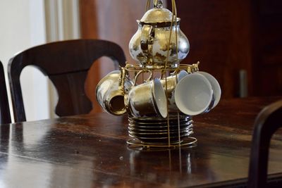 Close-up of coffee cups on table