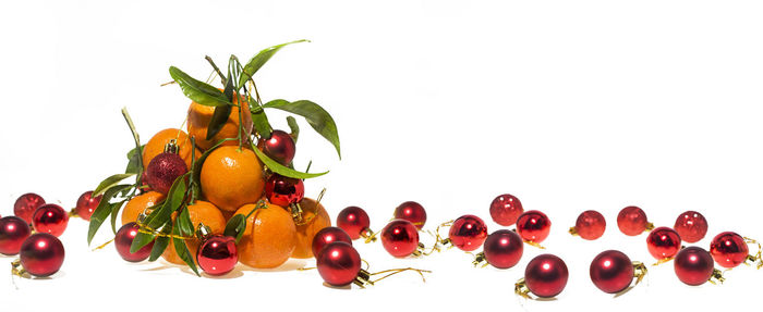 Close-up of fruits against white background