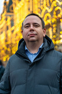 Portrait of young man standing outdoors