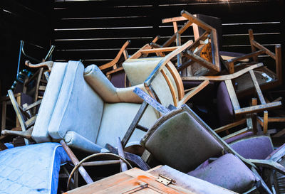 Abandoned chairs in junkyard