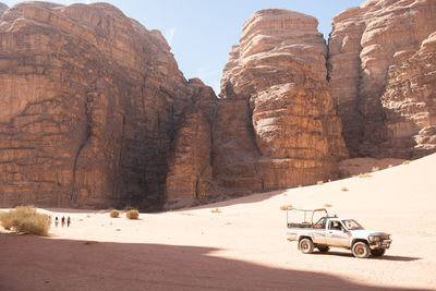 Dusty truck rests patiently in the desert sun