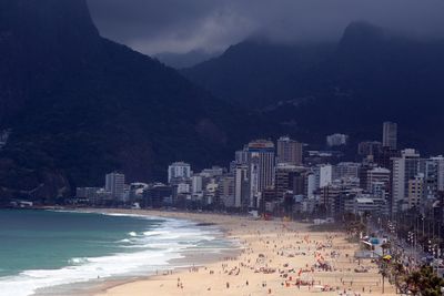 High angle view of copacabana beach in city against mountains