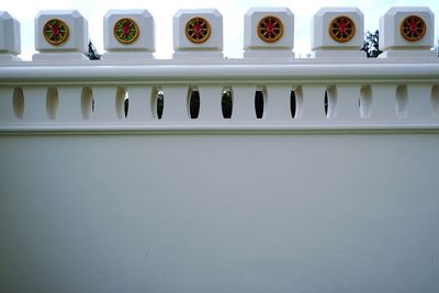 Close-up of electric lamp on wall