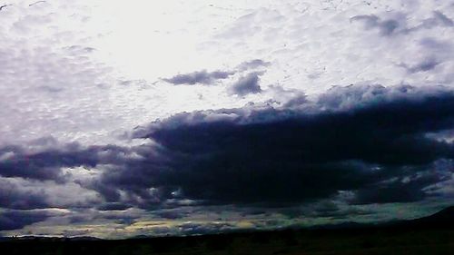 Scenic view of clouds over landscape