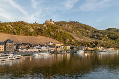 View at the city of bernkastel-kues at river moselle and mountains with vineyards