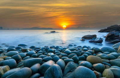 Scenic view of sea during sunset