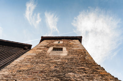 Low angle view of old building against sky