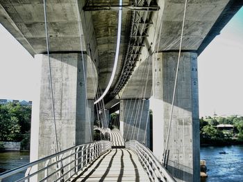 Long bridge over narrow walkway